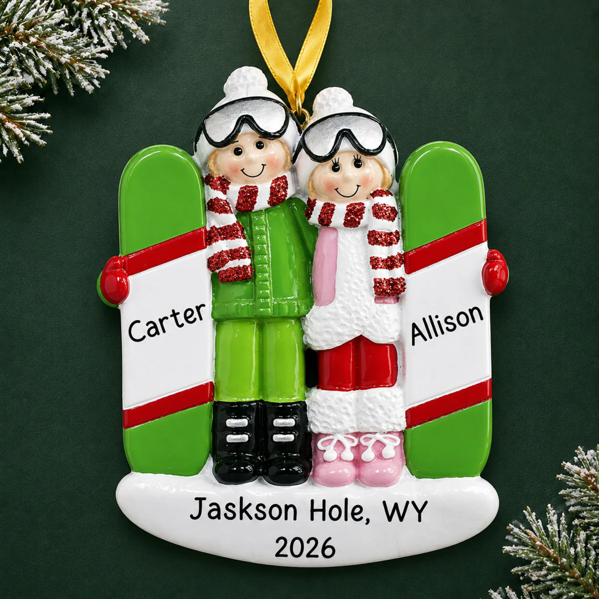 Personalized snowboard couple christmas ornament on a dark green pine background