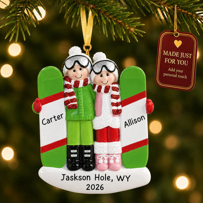 Snowboard couple christmas ornament hanging on a lit Christmas tree with a Made Just For You gift tag