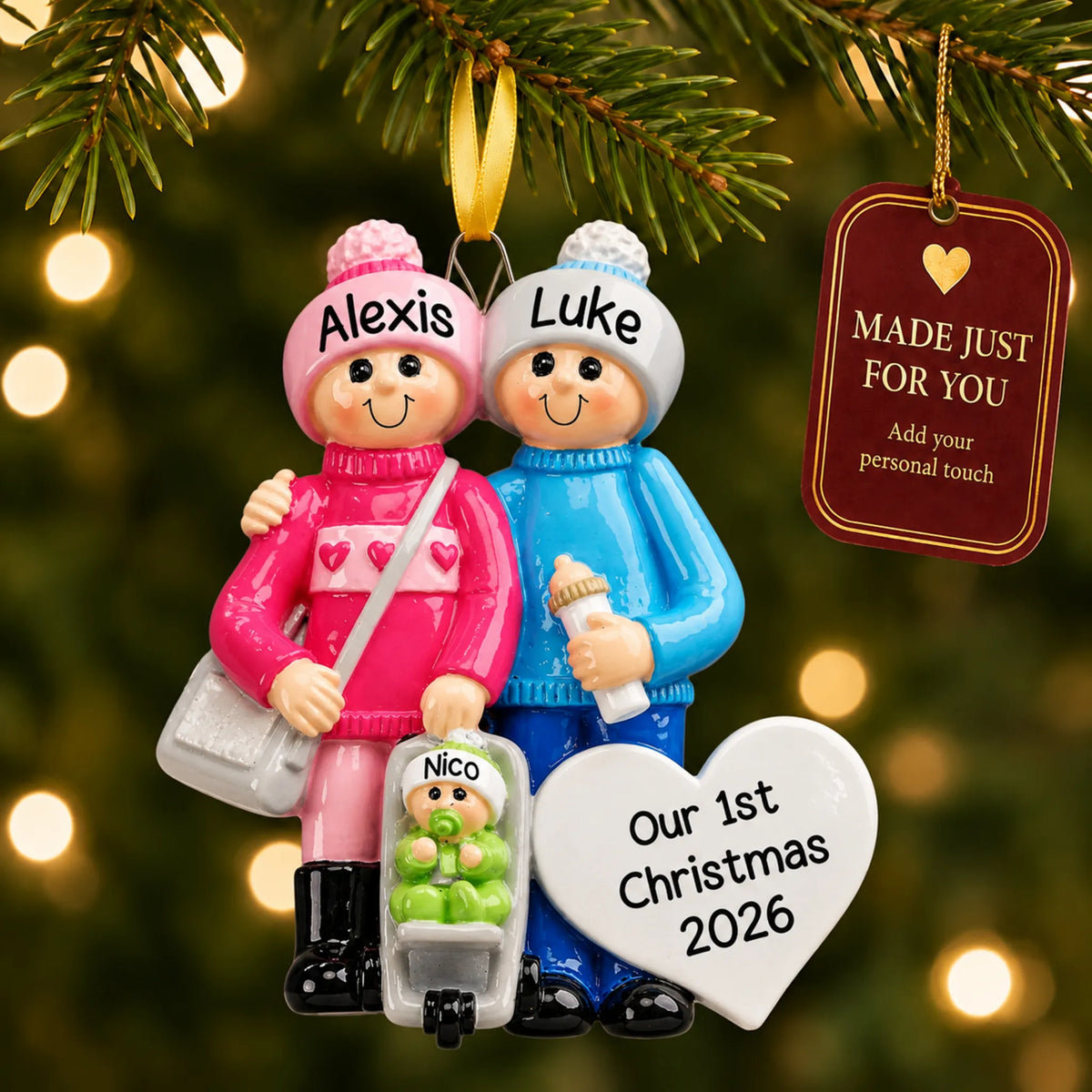 Our new family christmas ornament hanging on a lit Christmas tree with a Made Just For You gift tag
