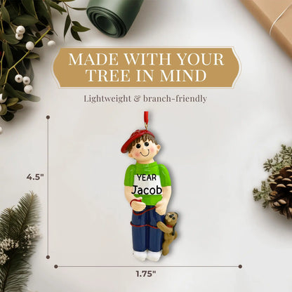 Adorno navideño de niño con perro 