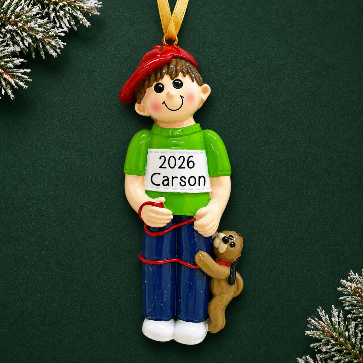Personalized Boy With Dog christmas ornament on a dark green pine background
