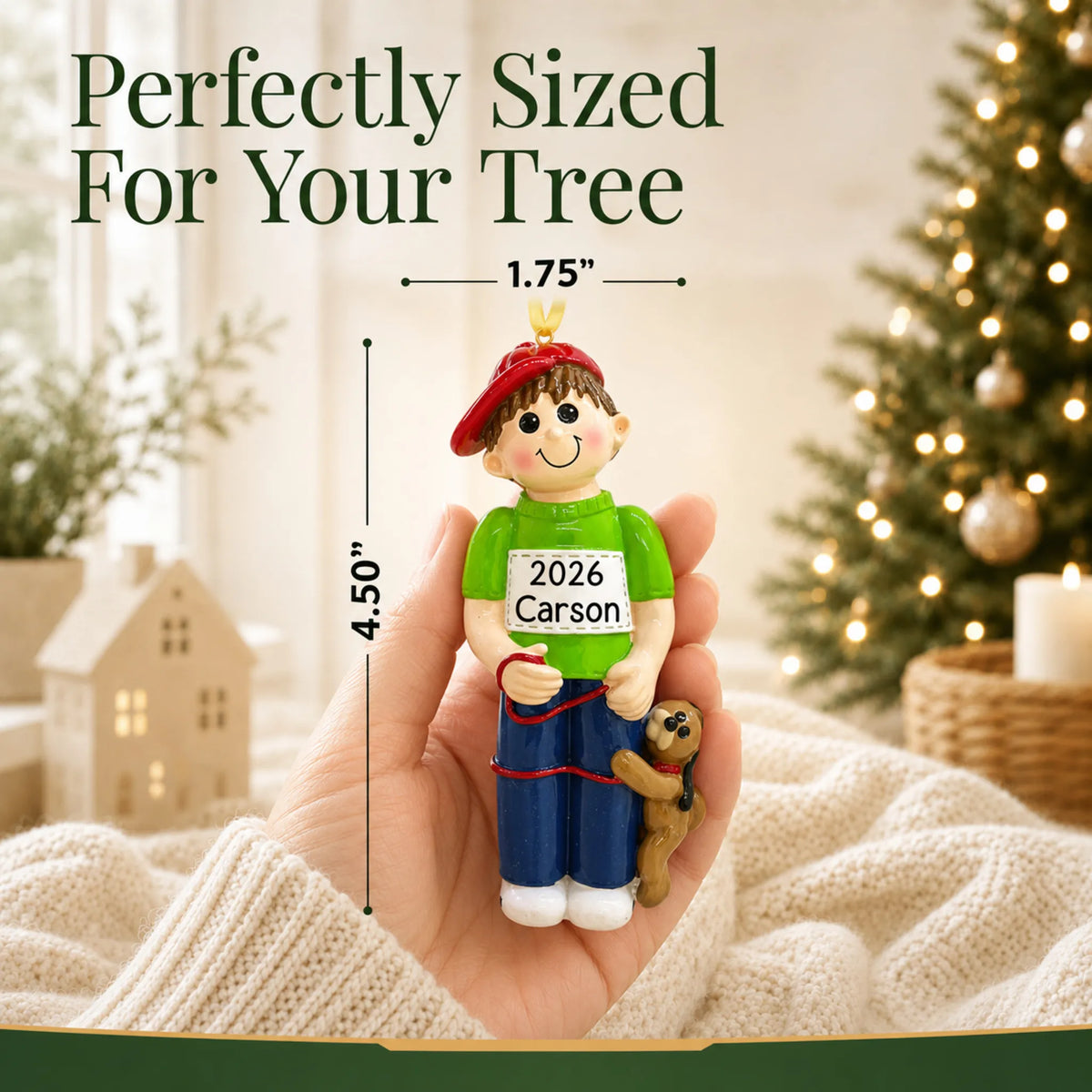 Size guide: the personalized Boy With Dog christmas ornament is 1.75 in wide by 4.50 in tall, shown in hand