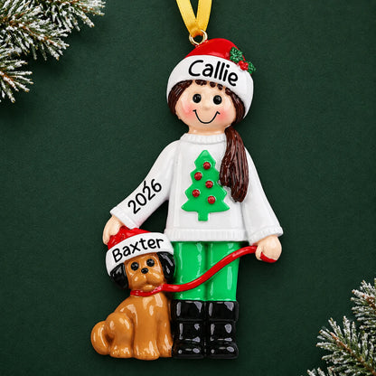 Personalized Girl With Dog christmas ornament on a dark green pine background