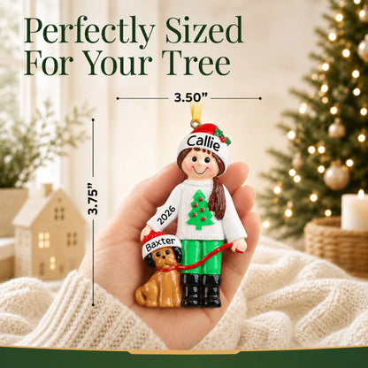 Size guide: the personalized Girl With Dog christmas ornament is 3.50 in wide by 3.75 in tall, shown in hand