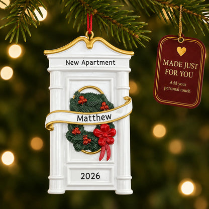 New or First Apartment christmas ornament hanging on a lit Christmas tree with a Made Just For You gift tag
