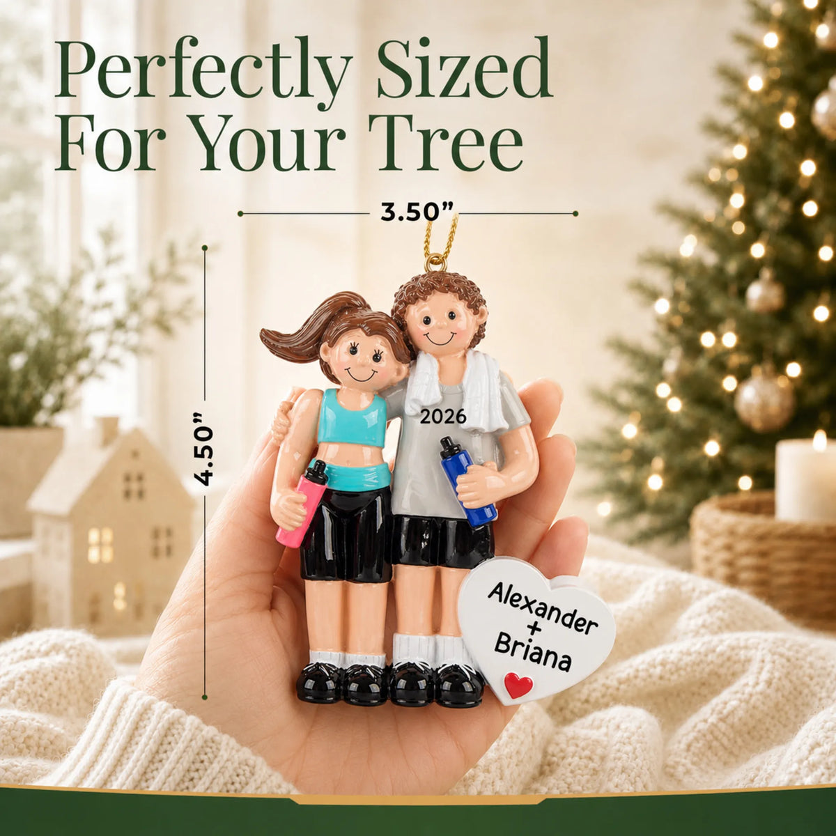 Size guide: the personalized workout couple christmas ornament is 3.50 in wide by 4.50 in tall, shown in hand