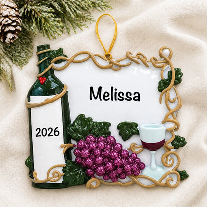 Personalized Red Wine Lover christmas ornament laid on a soft white knit blanket