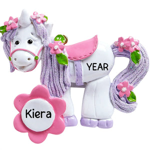 Personalized unicorn ornament with purple glitter mane, pink flowers, and laser engraved name and year