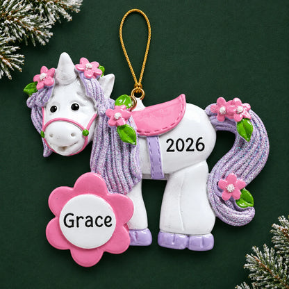 Personalized unicorn flower bloom christmas ornament on a dark green pine background