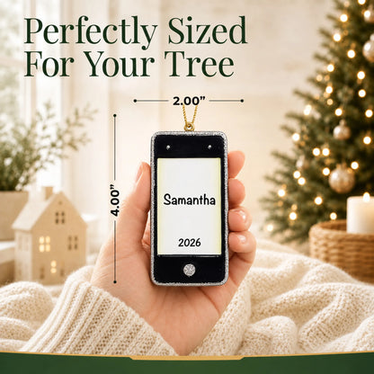 Size guide: the personalized cell phone christmas ornament is 2.00 in wide by 4.00 in tall, shown in hand