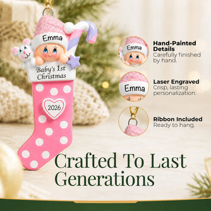 Hand-painted details and laser engraved personalization on the pink baby's 1st christmas stocking ornament, ribbon included