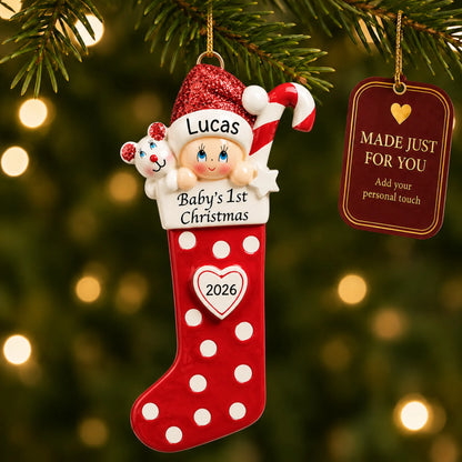 Red baby's 1st christmas stocking ornament hanging on a lit Christmas tree with a Made Just For You gift tag