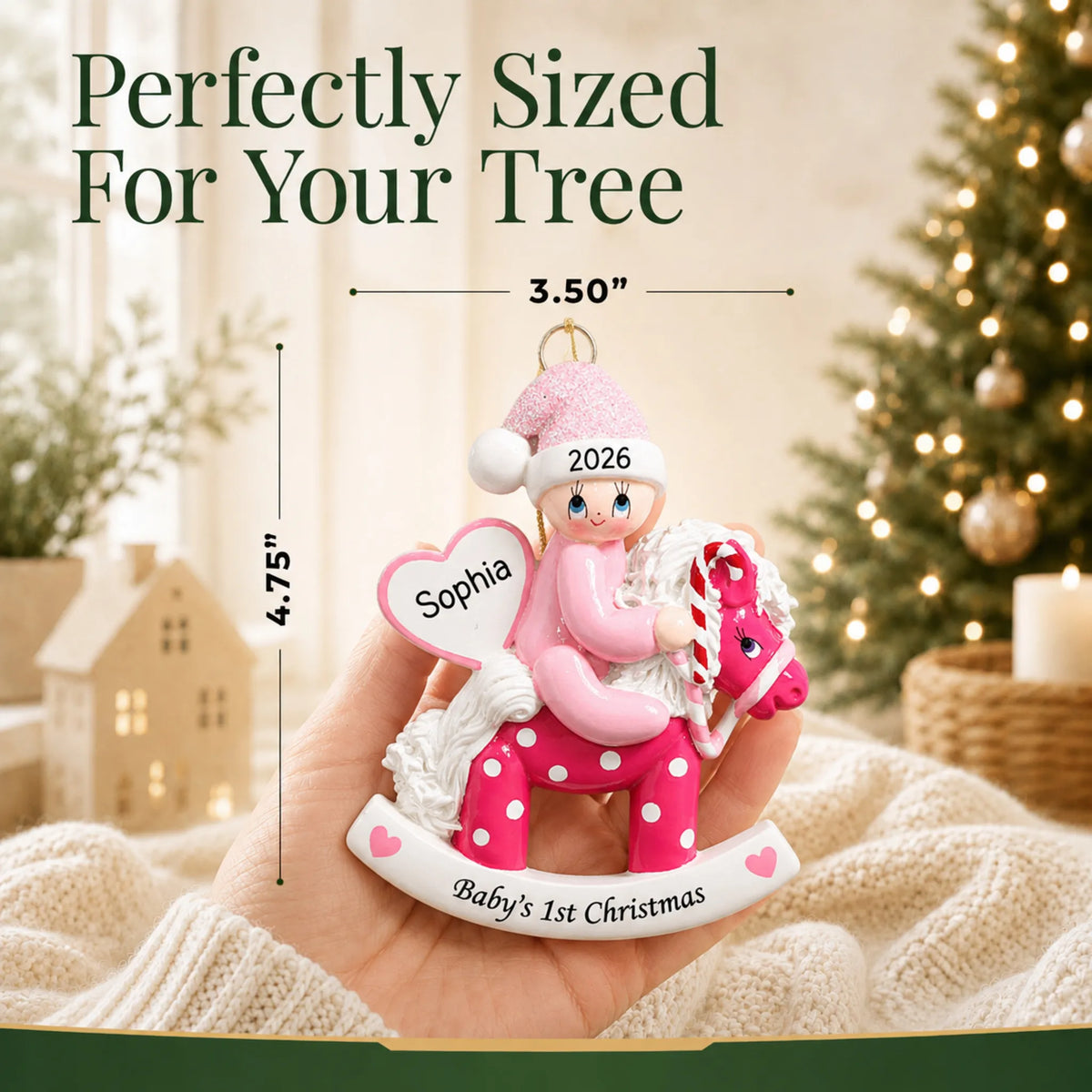 Size guide: the personalized pink baby's 1st christmas rocking horse ornament is 3.50 in wide by 4.75 in tall, shown in hand