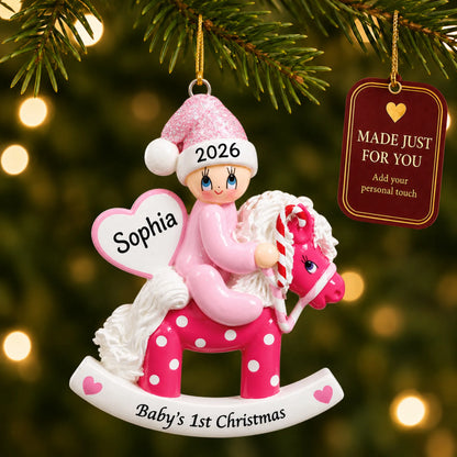 Pink baby's 1st christmas rocking horse ornament hanging on a lit Christmas tree with a Made Just For You gift tag