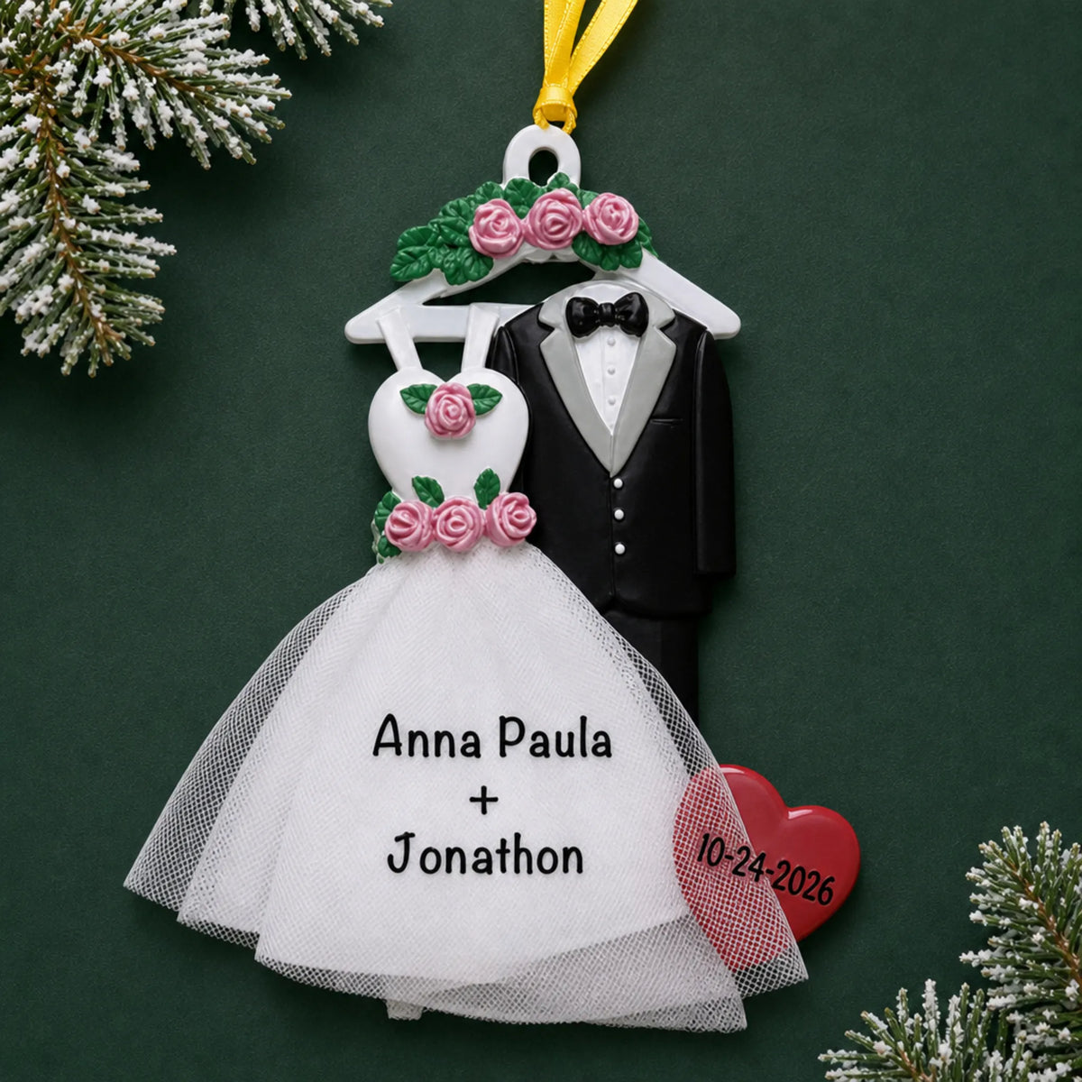 Personalized bride and groom attire Christmas ornament with a wedding gown and tuxedo with names and a date heart