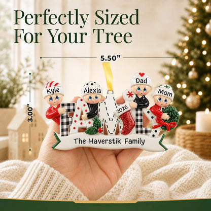 Plaid family of 4 ornament shown at 5.50 by 3.00 inches, perfectly sized for your Christmas tree