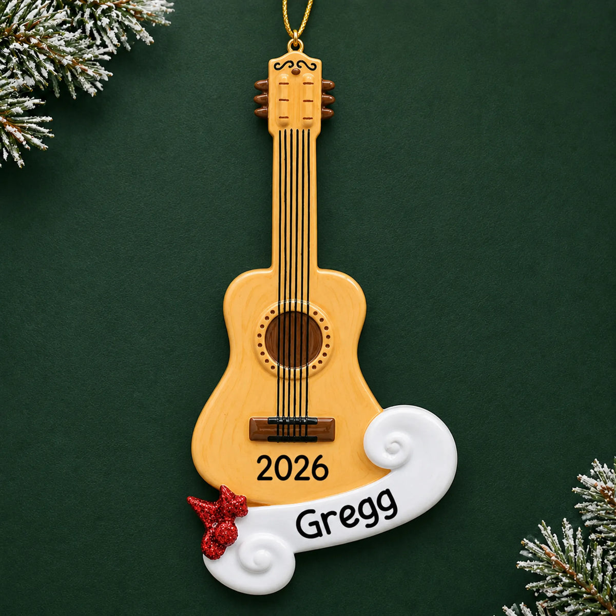 Personalized acoustic guitar christmas ornament on a dark green pine background