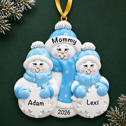 Personalized single parent snowman with 2 children christmas ornament on a dark green pine background