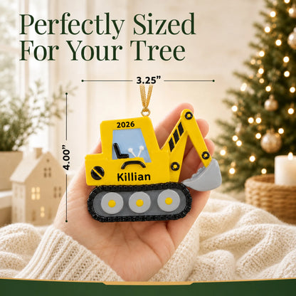 Size guide: the personalized excavator christmas ornament is 3.25 in wide by 4.00 in tall, shown in hand