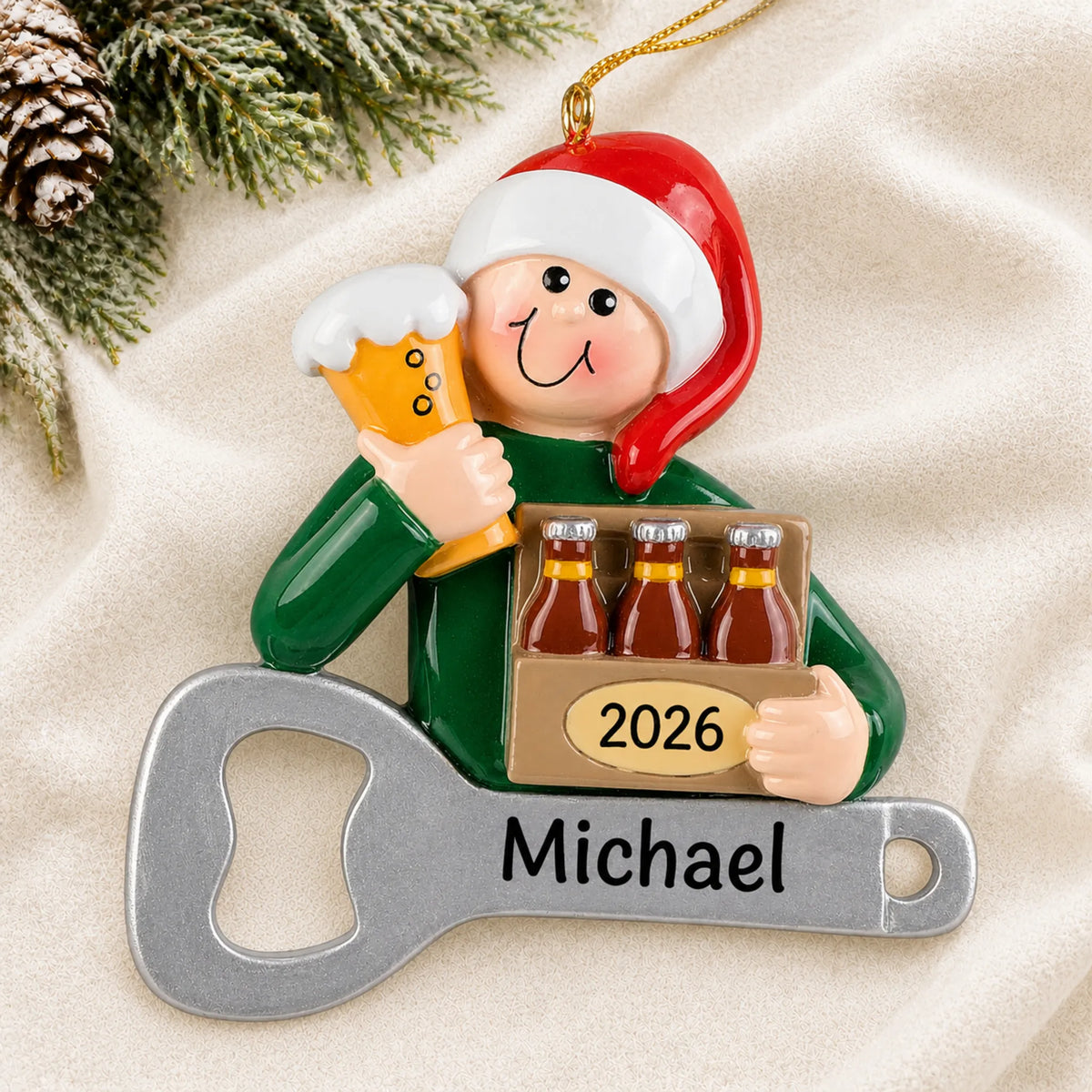 Personalized Beer Lover christmas ornament laid on a soft white knit blanket