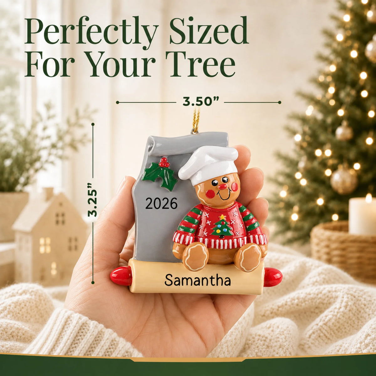 Size guide: the personalized Gingerbread Baker christmas ornament is 3.50 in wide by 3.25 in tall, shown in hand
