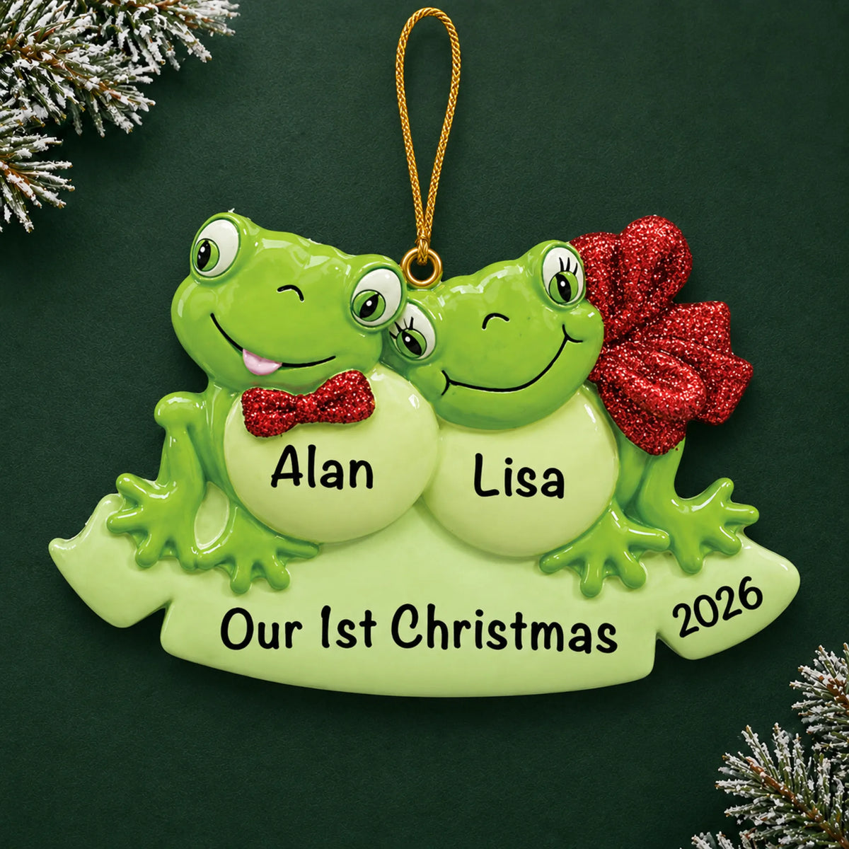 Personalized frog couple christmas ornament on a dark green pine background