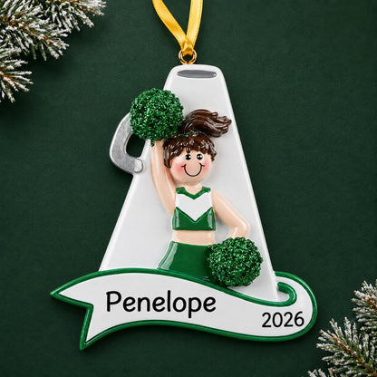 Personalized cheerleader green megaphone christmas ornament on a dark green pine background