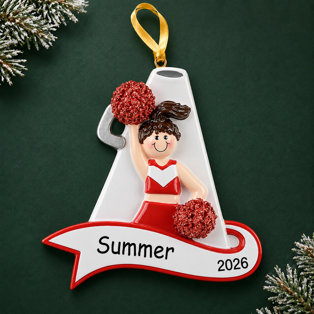 Personalized cheerleader red megaphone christmas ornament on a dark green pine background