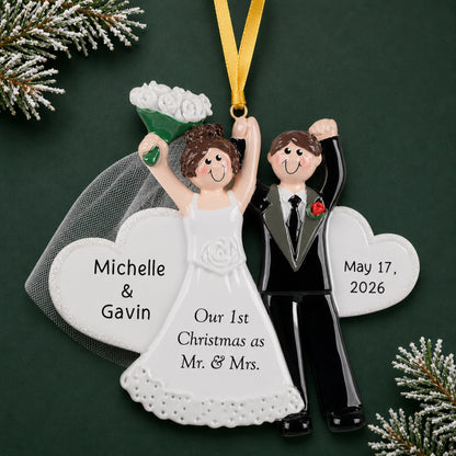 Personalized wedding day Christmas ornament with a cheering bride and groom, names, date and a Mr. & Mrs. heart