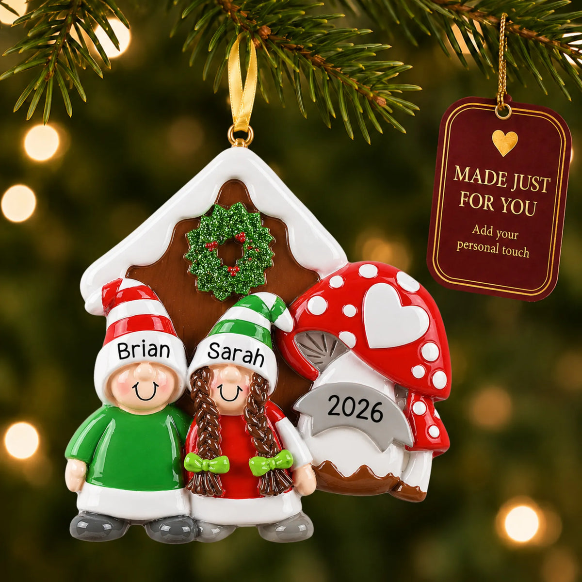Gnome mushroom couple christmas ornament hanging on a lit Christmas tree with a Made Just For You gift tag