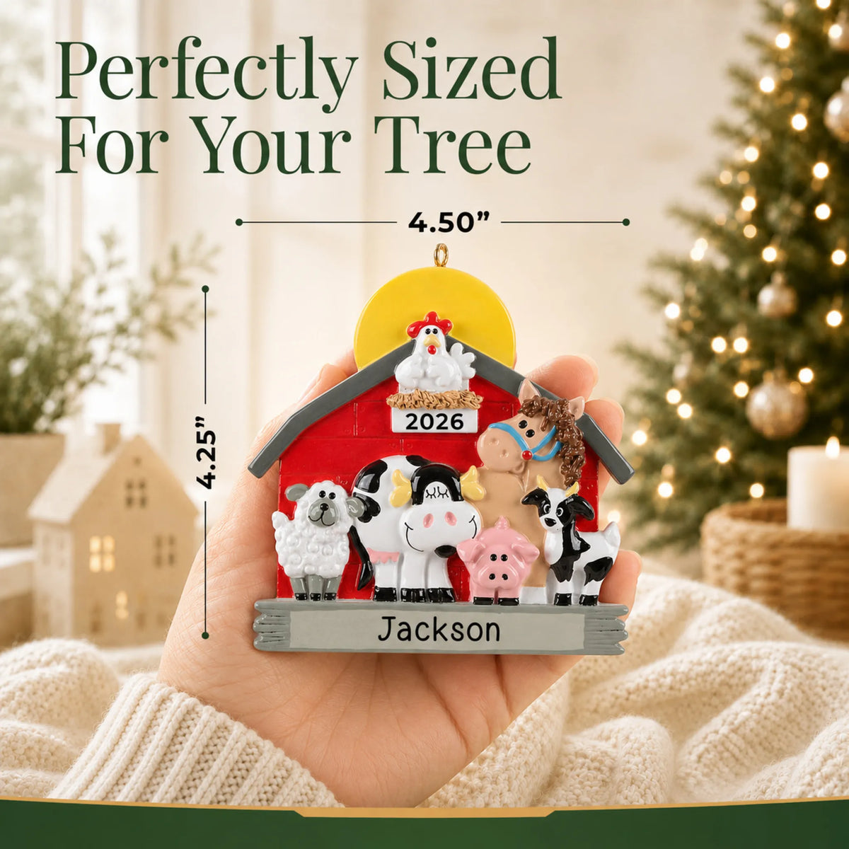 Size guide: the personalized farm animals barn christmas ornament is 4.50 in wide by 4.25 in tall, shown in hand