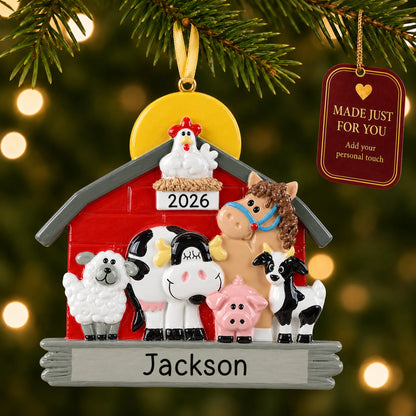 Farm animals barn christmas ornament hanging on a lit Christmas tree with a Made Just For You gift tag