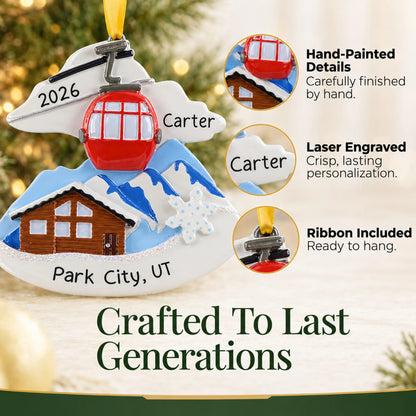 Hand-painted details and laser engraved personalization on the ski lodge christmas ornament, ribbon included
