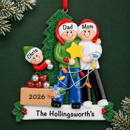 Personalized decorating the tree family of 3 Christmas ornament, parents and child holding a gold star