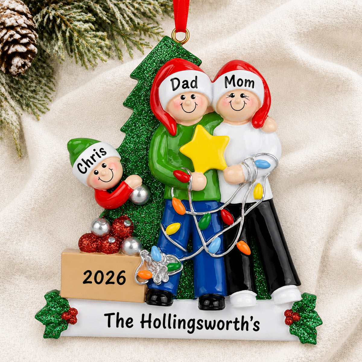Personalized decorating the tree family of 3 ornament with Dad, Mom and Chris holding a gold star