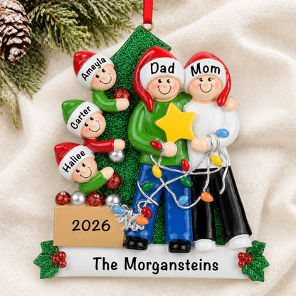 Personalized decorating the tree family of 5 Christmas ornament hanging on tree with names and family banner