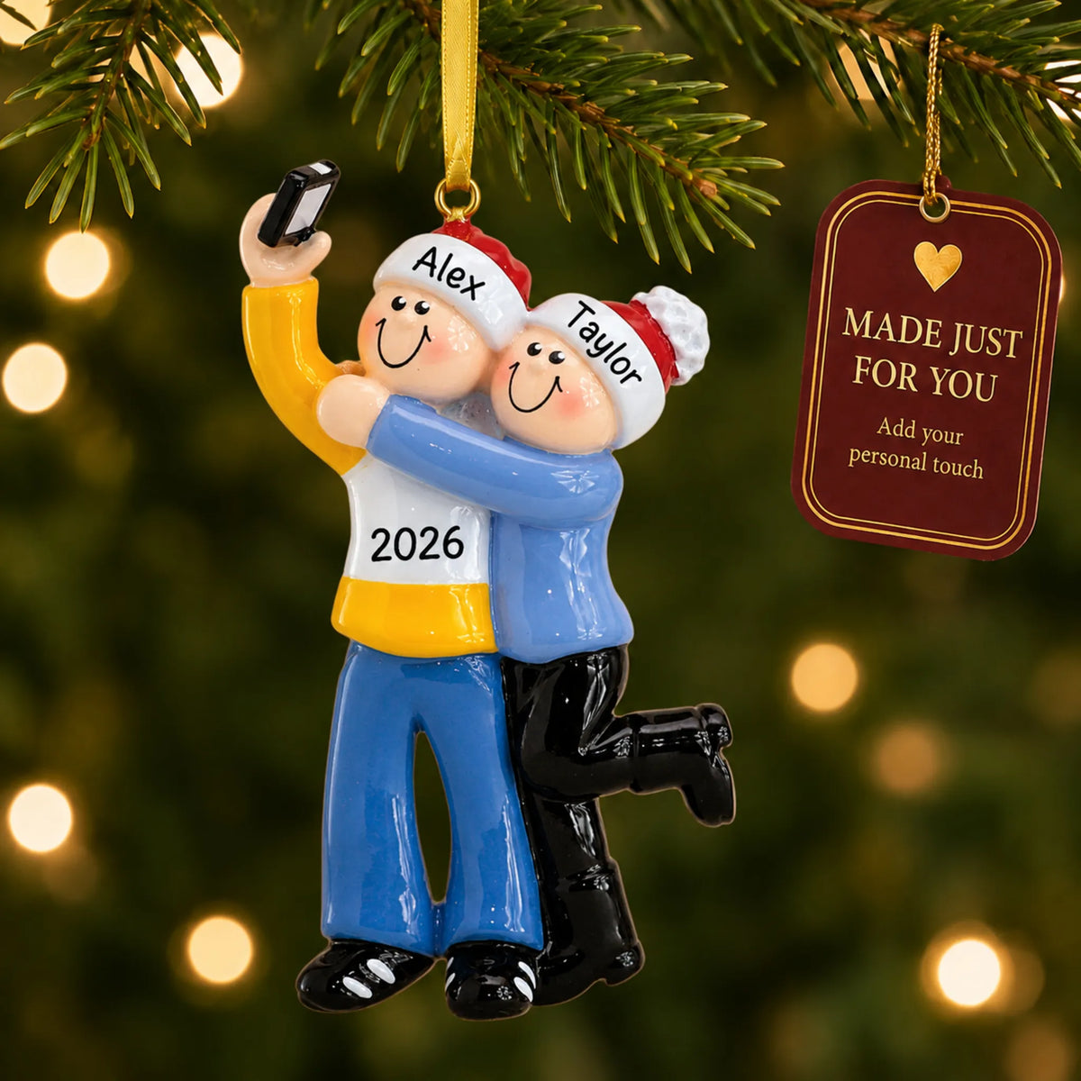 Selfie couple christmas ornament hanging on a lit Christmas tree with a Made Just For You gift tag