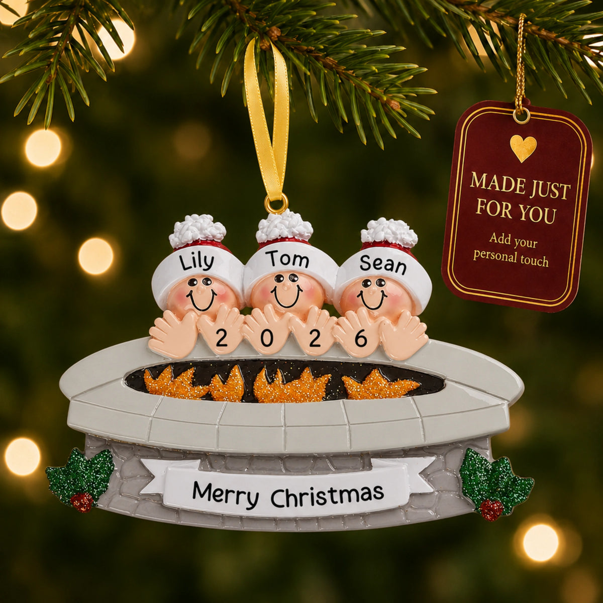 Personalized fire pit family of 3 christmas ornament hanging on the tree with a Made Just For You gift tag