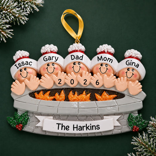 Personalized fire pit family of 5 christmas ornament with five named figures around a glowing fire pit