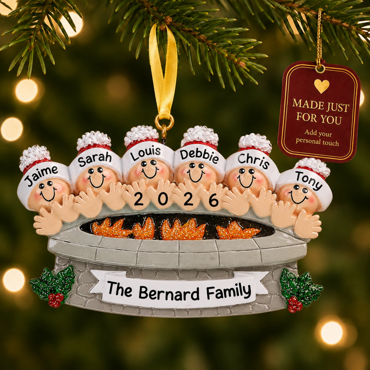 Personalized fire pit family of 6 christmas ornament on a tree with a Made Just For You gift tag