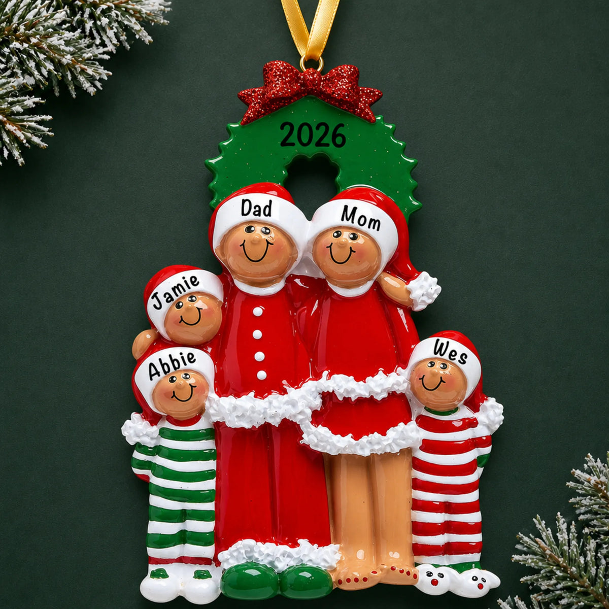 Personalized ethnic family of 5 christmas ornament on a dark green pine background