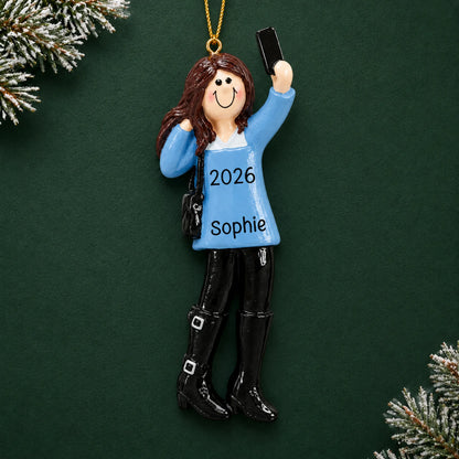 Personalized selfie girl christmas ornament on a dark green pine background