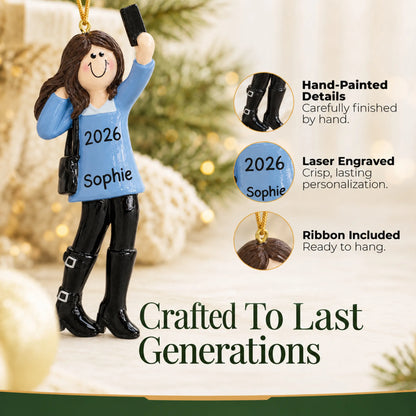 Hand-painted details and laser engraved personalization on the selfie girl christmas ornament, ribbon included