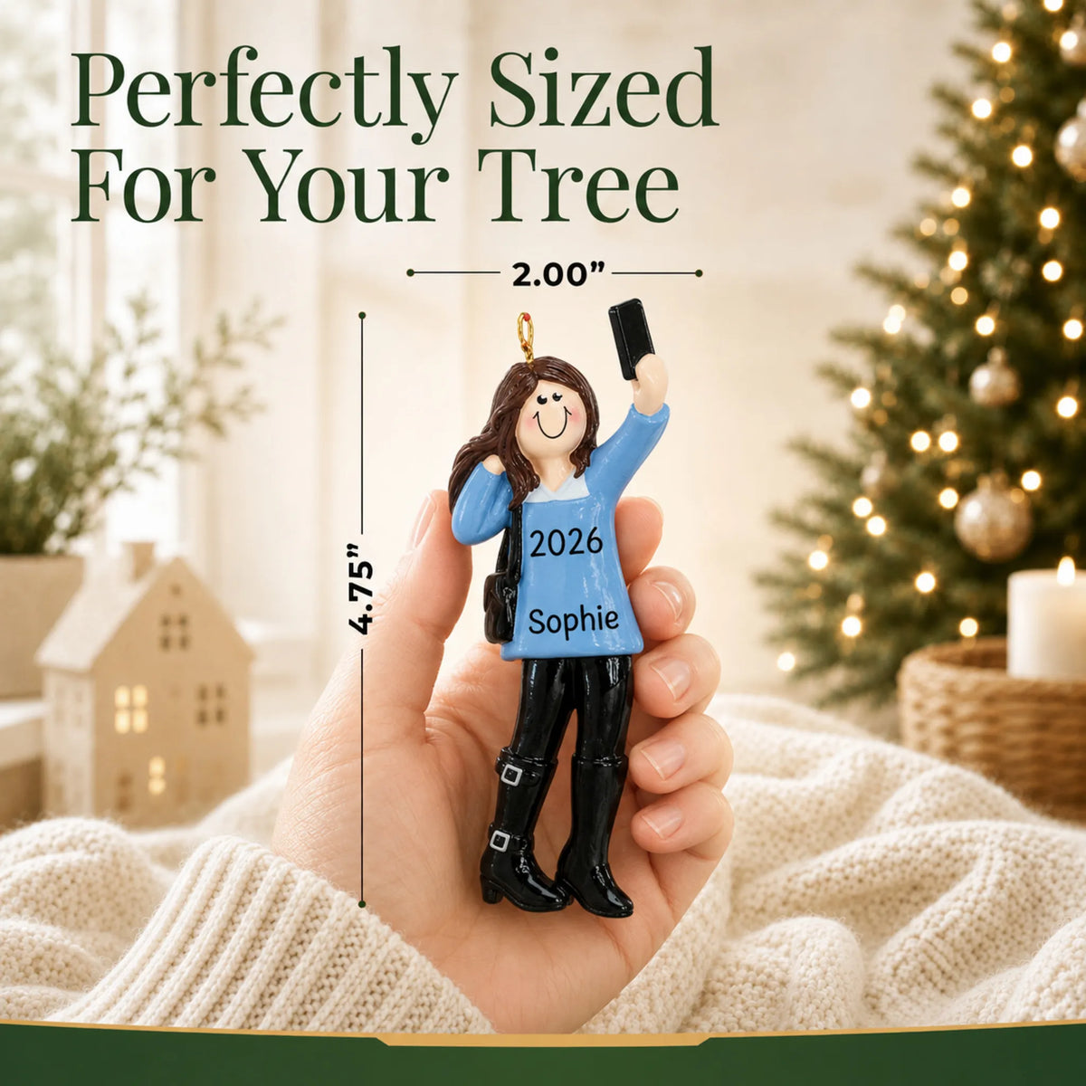 Size guide: the personalized selfie girl christmas ornament is 2.00 in wide by 4.75 in tall, shown in hand