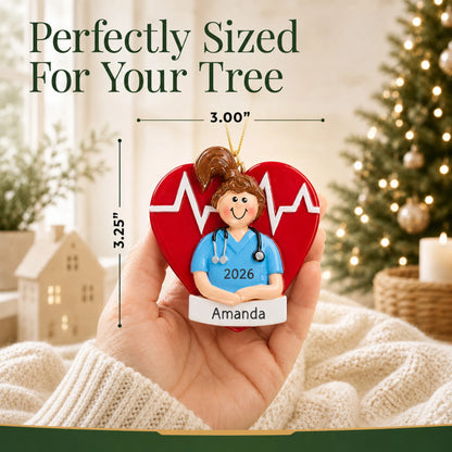 Size guide: the personalized nurse red heart christmas ornament is 3.00 in wide by 3.25 in tall, shown in hand
