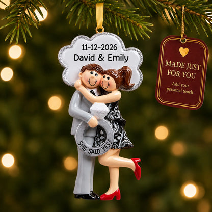 Personalized She Said Yes brunette couple Christmas ornament on a lit Christmas tree with a Made Just For You tag