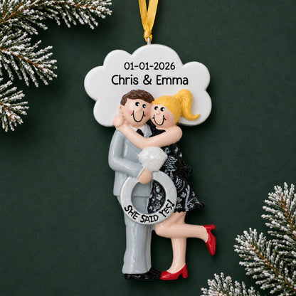 Personalized She Said Yes blonde couple Christmas ornament with a hugging blonde engaged couple, ring, names and date