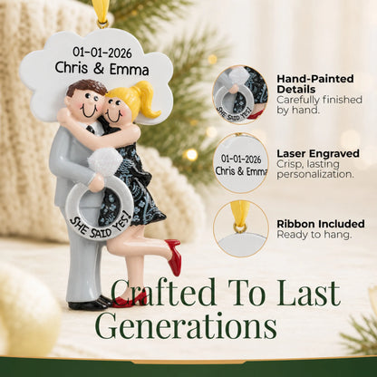 Close-up of the personalized She Said Yes blonde couple Christmas ornament: hand-painted detail, laser engraving