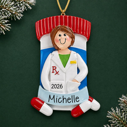 Personalized pharmacist woman christmas ornament on a dark green pine background