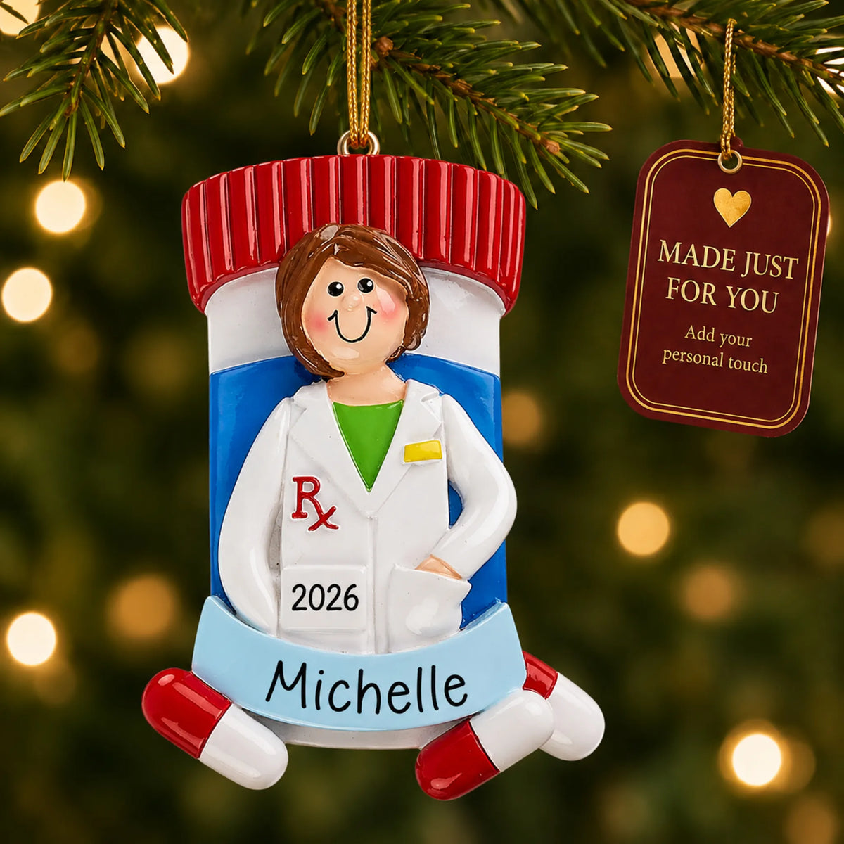 Pharmacist woman christmas ornament hanging on a lit Christmas tree with a Made Just For You gift tag